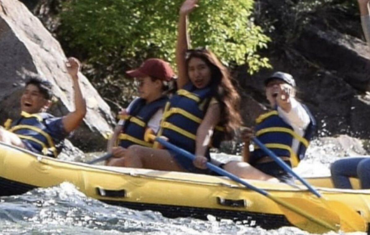 crew enjoying rafting